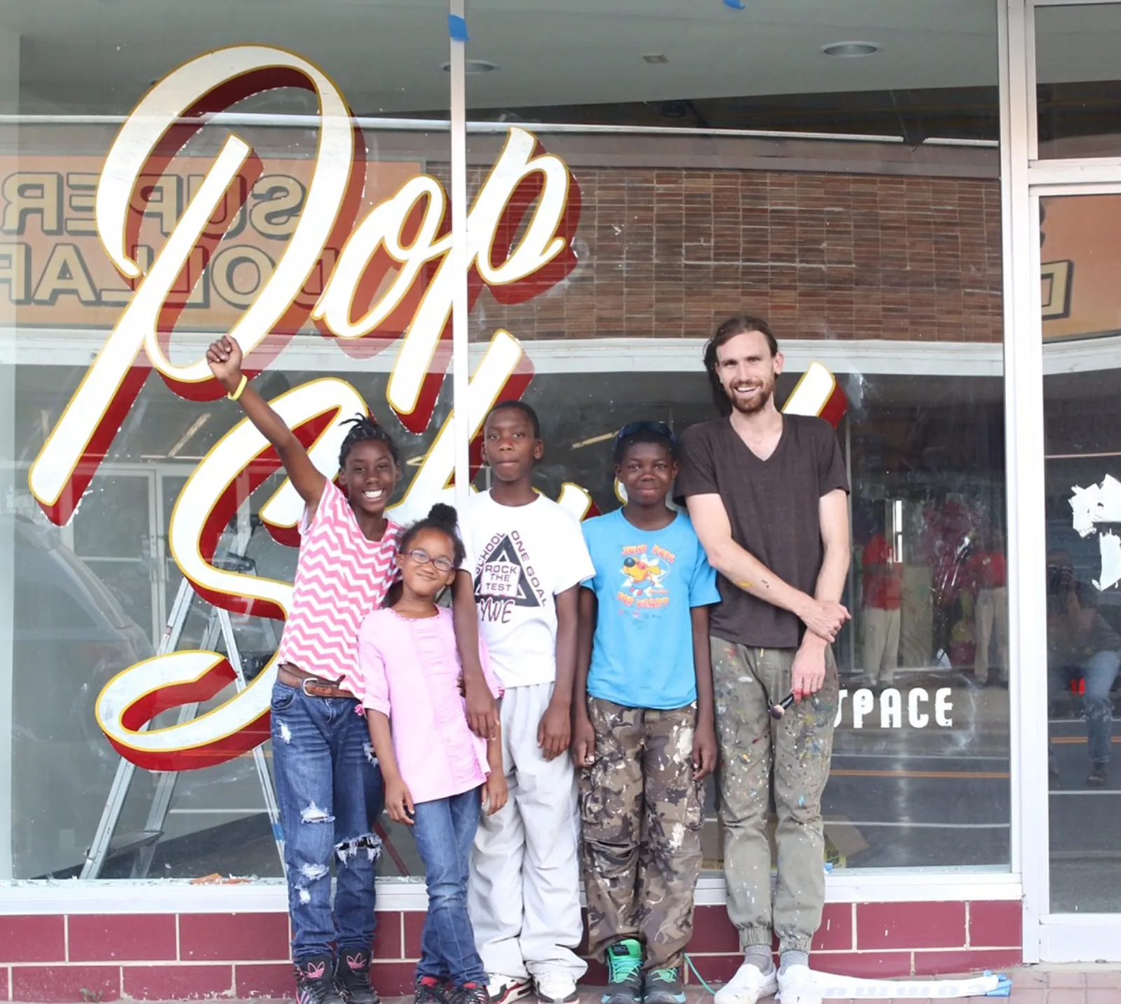 Creighton with kids at Pop Start Community Space