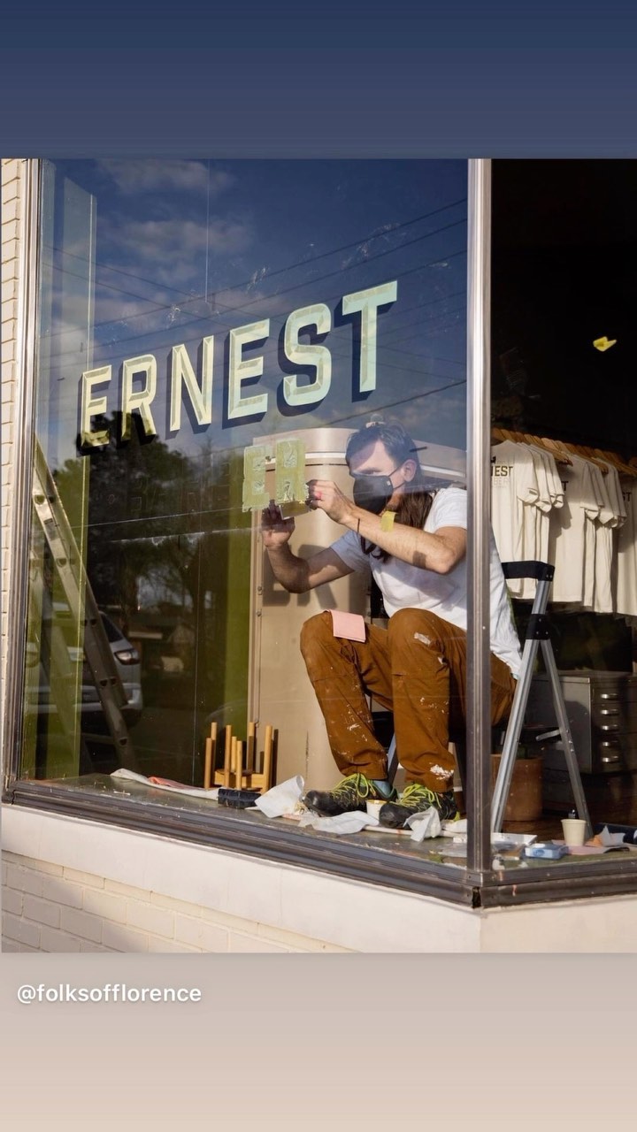 See the Ernest Barber window lettering in motion